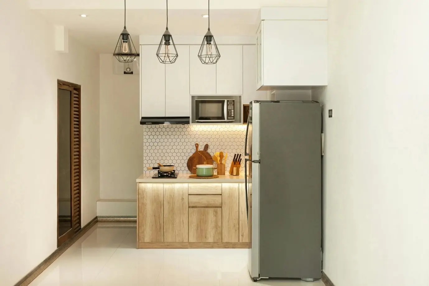 small kitchen with wooden cabinet and led lights