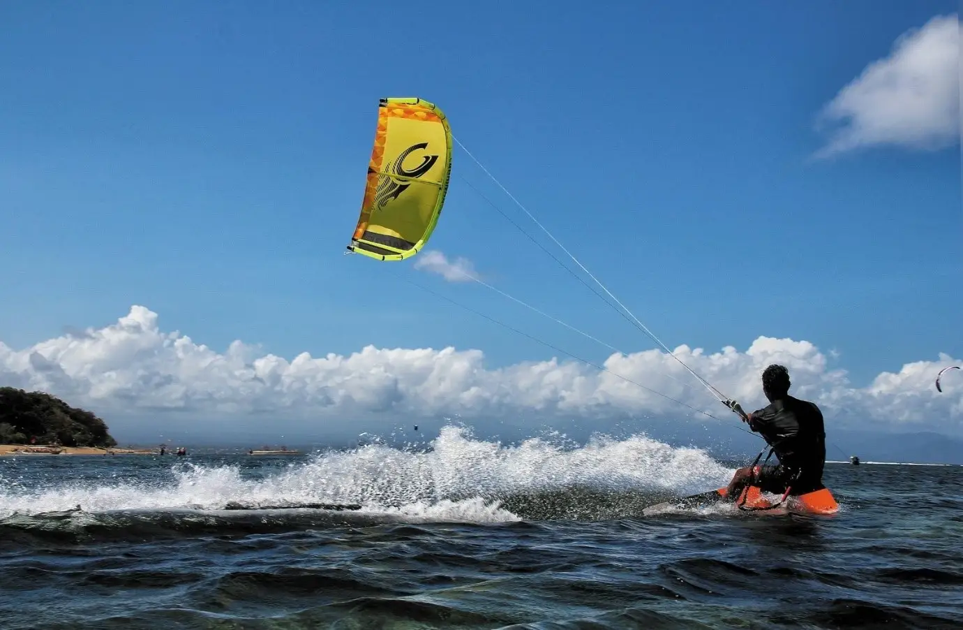 A man parasailing over the beach in Goa. A man parasailing over the beach in Goa.