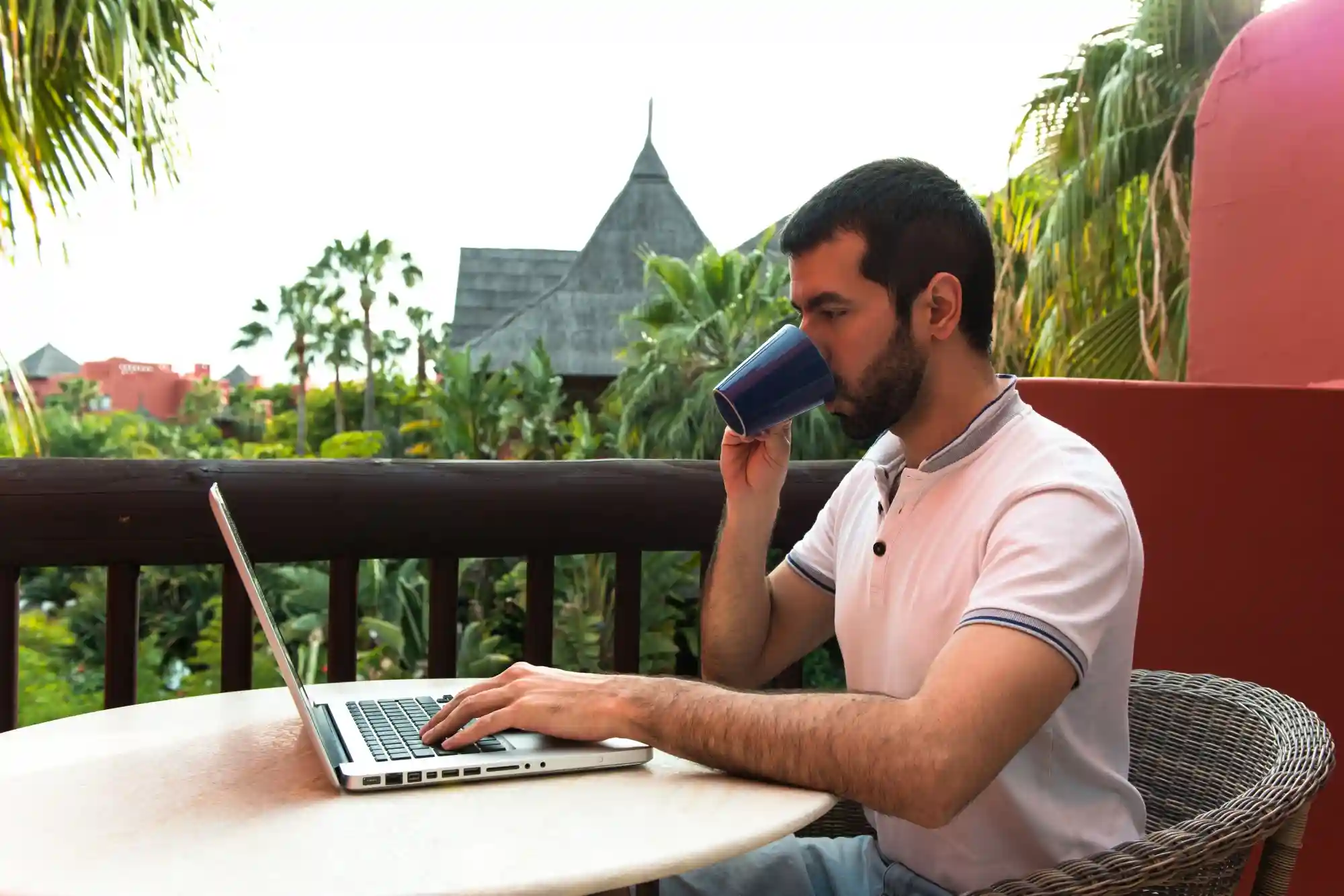 Person working with his laptop Person working with his laptop