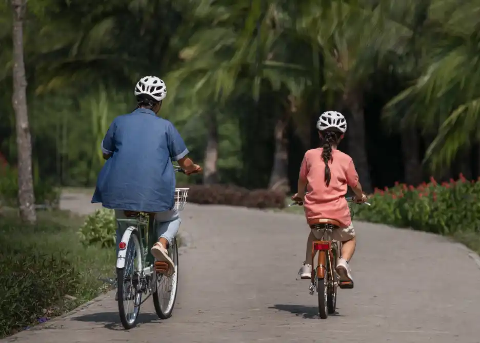 Children cycling around their neighbourhood in Goa.