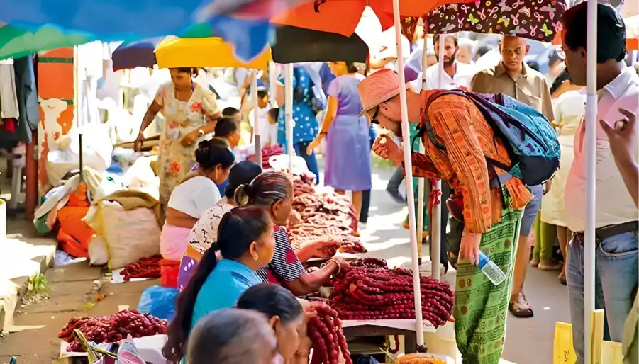 The bustling Mapusa Market, near your home in Panjim.