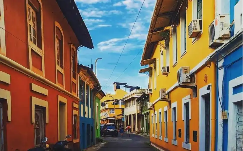 Bright-hued streets of Fontainhas, Panjim, reflecting the beauty around a property in Goa.