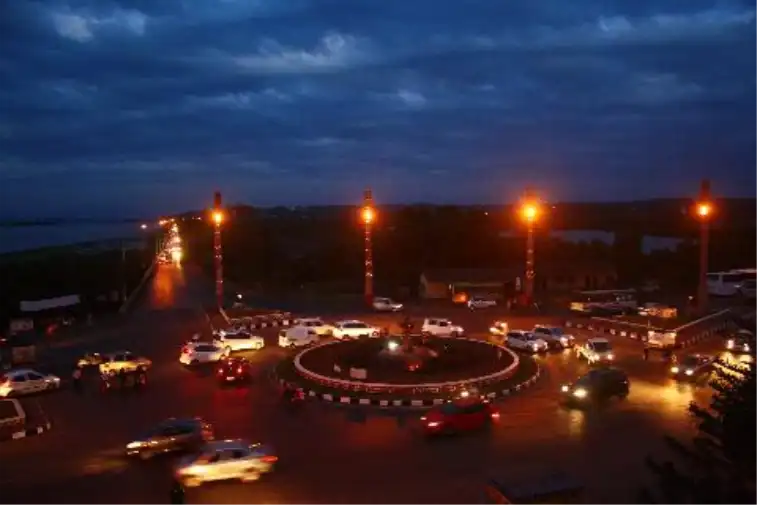Panjim city night with lit streets showcasing the city life near a property in Goa.