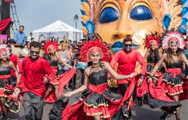Red and Black dance performance during the Carnival, witnessed near a home in Panjim, Goa.<br />
