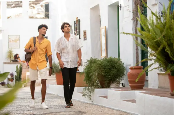  Two guys walking around their neighbourhood in Goa.