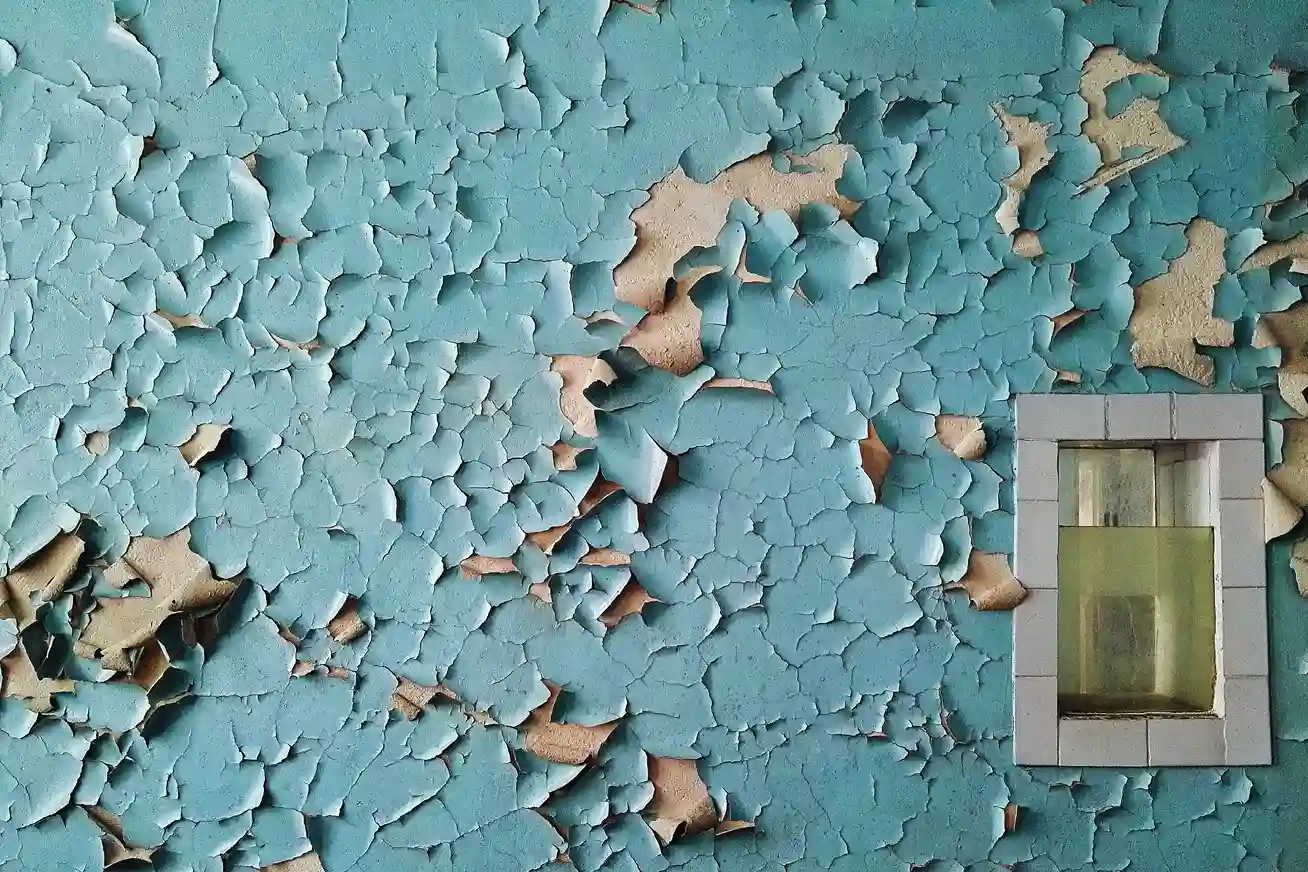 Humidity can cause paint to peel on the walls.